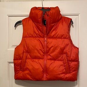 Orange puffer vest